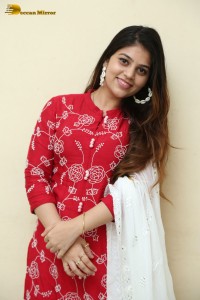 Telugu Actress Bandhavi Sridhar in a red salwar dress