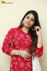 Telugu Actress Bandhavi Sridhar in a red salwar dress