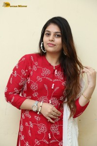 Telugu Actress Bandhavi Sridhar in a red salwar dress
