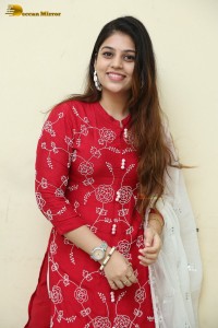 Telugu Actress Bandhavi Sridhar in a red salwar dress