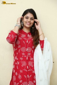 Telugu Actress Bandhavi Sridhar in a red salwar dress