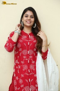 Telugu Actress Bandhavi Sridhar in a red salwar dress