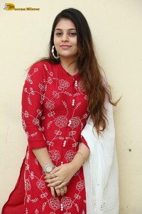 Telugu Actress Bandhavi Sridhar in a red salwar dress