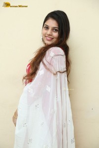 Telugu Actress Bandhavi Sridhar in a red salwar dress