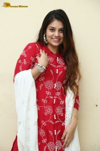 Telugu Actress Bandhavi Sridhar in a red salwar dress