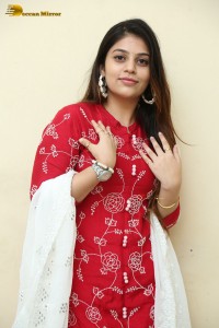 Telugu Actress Bandhavi Sridhar in a red salwar dress