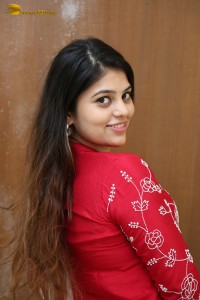 Telugu Actress Bandhavi Sridhar in a red salwar dress