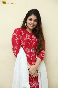 Telugu Actress Bandhavi Sridhar in a red salwar dress