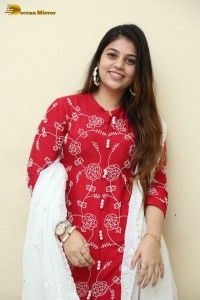 Telugu Actress Bandhavi Sridhar in a red salwar dress