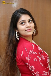 Telugu Actress Bandhavi Sridhar in a red salwar dress