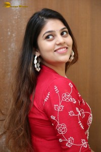 Telugu Actress Bandhavi Sridhar in a red salwar dress