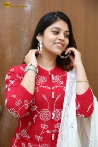 Telugu Actress Bandhavi Sridhar in a red salwar dress
