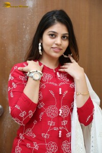 Telugu Actress Bandhavi Sridhar in a red salwar dress