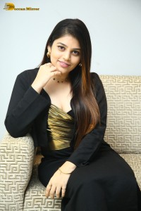 Actress Bandhavi Sridhar in a black dress