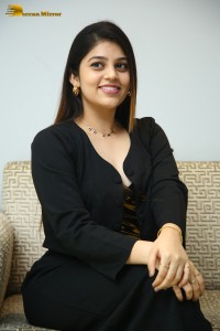 Actress Bandhavi Sridhar in a black dress