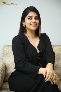 Actress Bandhavi Sridhar in a black dress