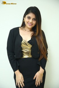 Actress Bandhavi Sridhar in a black dress