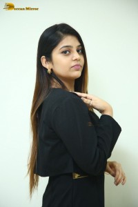 Actress Bandhavi Sridhar in a black dress