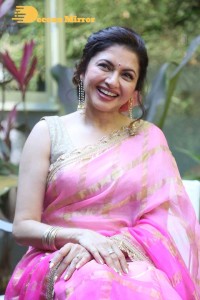 Indian Actress Bhagyashree posing in a Pink Saree