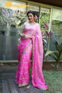 Indian Actress Bhagyashree posing in a Pink Saree