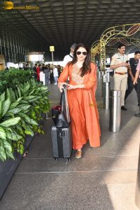 Maine Pyar Kiya actress bhagyashree gorgeous in a orange dress at mumbai airport
