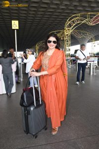 Maine Pyar Kiya actress bhagyashree gorgeous in a orange dress at mumbai airport