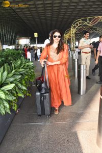 Maine Pyar Kiya actress bhagyashree gorgeous in a orange dress at mumbai airport