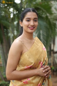 actress Bhavana Vazhapandal ravishing looks in a gold color saree