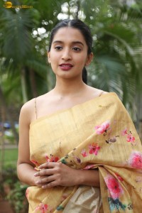 actress Bhavana Vazhapandal ravishing looks in a gold color saree