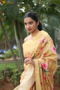 actress Bhavana Vazhapandal ravishing looks in a gold color saree