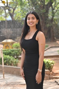 actress Bhavana Vazhapandal sexy looks in a black dress