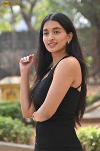 actress Bhavana Vazhapandal sexy looks in a black dress