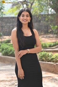 actress Bhavana Vazhapandal sexy looks in a black dress