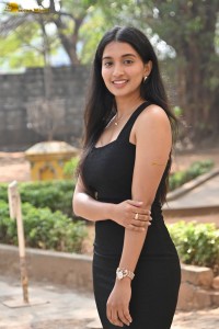 actress Bhavana Vazhapandal sexy looks in a black dress