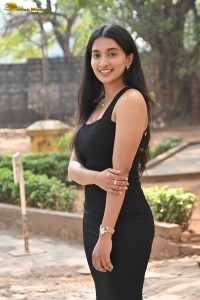 actress Bhavana Vazhapandal sexy looks in a black dress