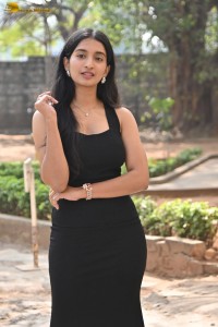 actress Bhavana Vazhapandal sexy looks in a black dress
