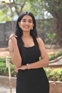 actress Bhavana Vazhapandal sexy looks in a black dress