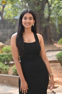 actress Bhavana Vazhapandal sexy looks in a black dress