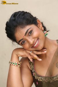 actress bhoomi shetty cute in a green salwar dress