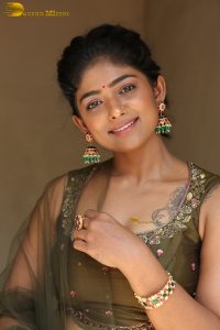 actress bhoomi shetty cute in a green salwar dress