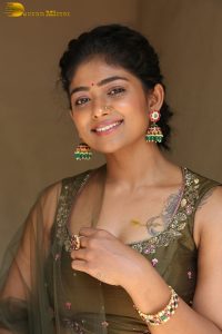 actress bhoomi shetty cute in a green salwar dress