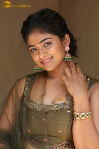 actress bhoomi shetty cute in a green salwar dress