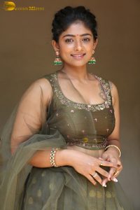 actress bhoomi shetty cute in a green salwar dress