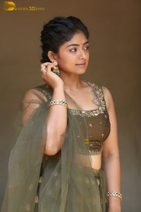 actress bhoomi shetty cute in a green salwar dress