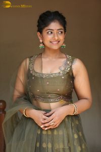 actress bhoomi shetty cute in a green salwar dress