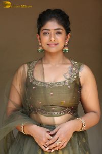 actress bhoomi shetty cute in a green salwar dress