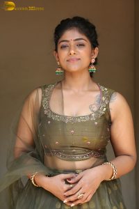 actress bhoomi shetty cute in a green salwar dress