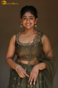 actress bhoomi shetty cute in a green salwar dress