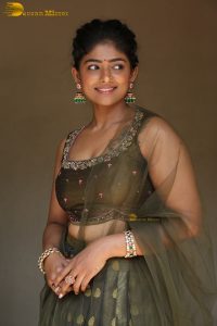 actress bhoomi shetty cute in a green salwar dress