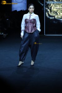 bollywood actress Bhumi Pednekar chic look while doing a ramp walk for a fashion show